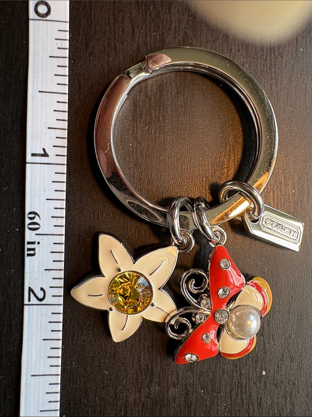 Coach Silver Key Ring with Cream Flower and Red Butterfly Charms - Picture 1 of 1